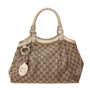 Bolsa Gucci Sukey GG Supreme e Verniz Bege