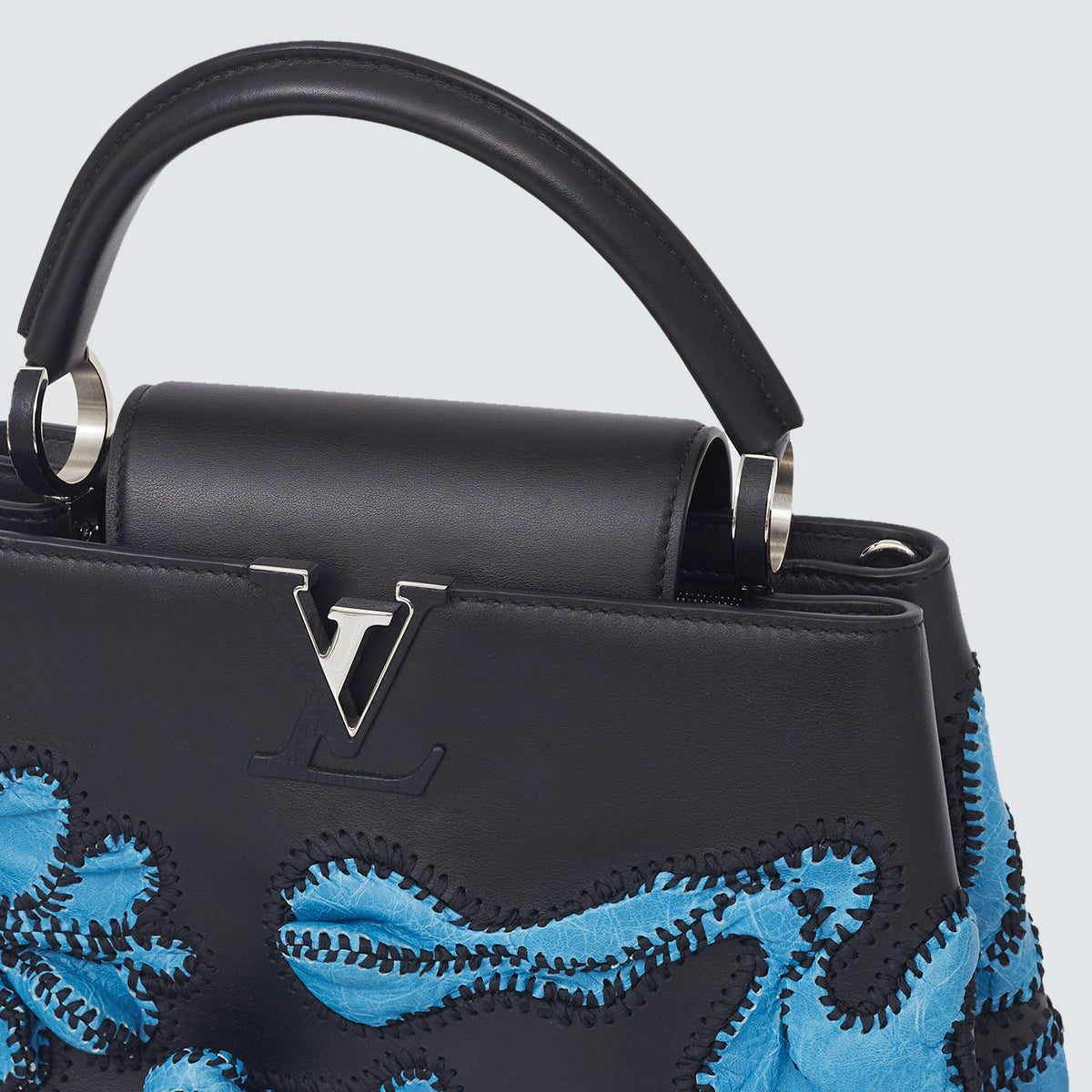 Bolsa Louis Vuitton Arty Capucines