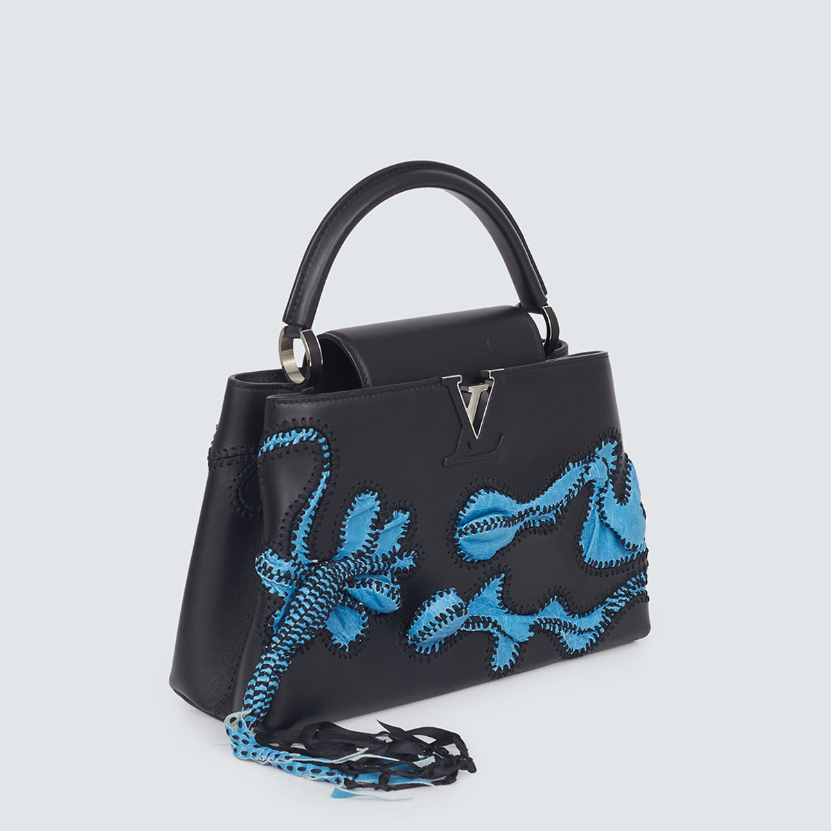 Bolsa Louis Vuitton Arty Capucines