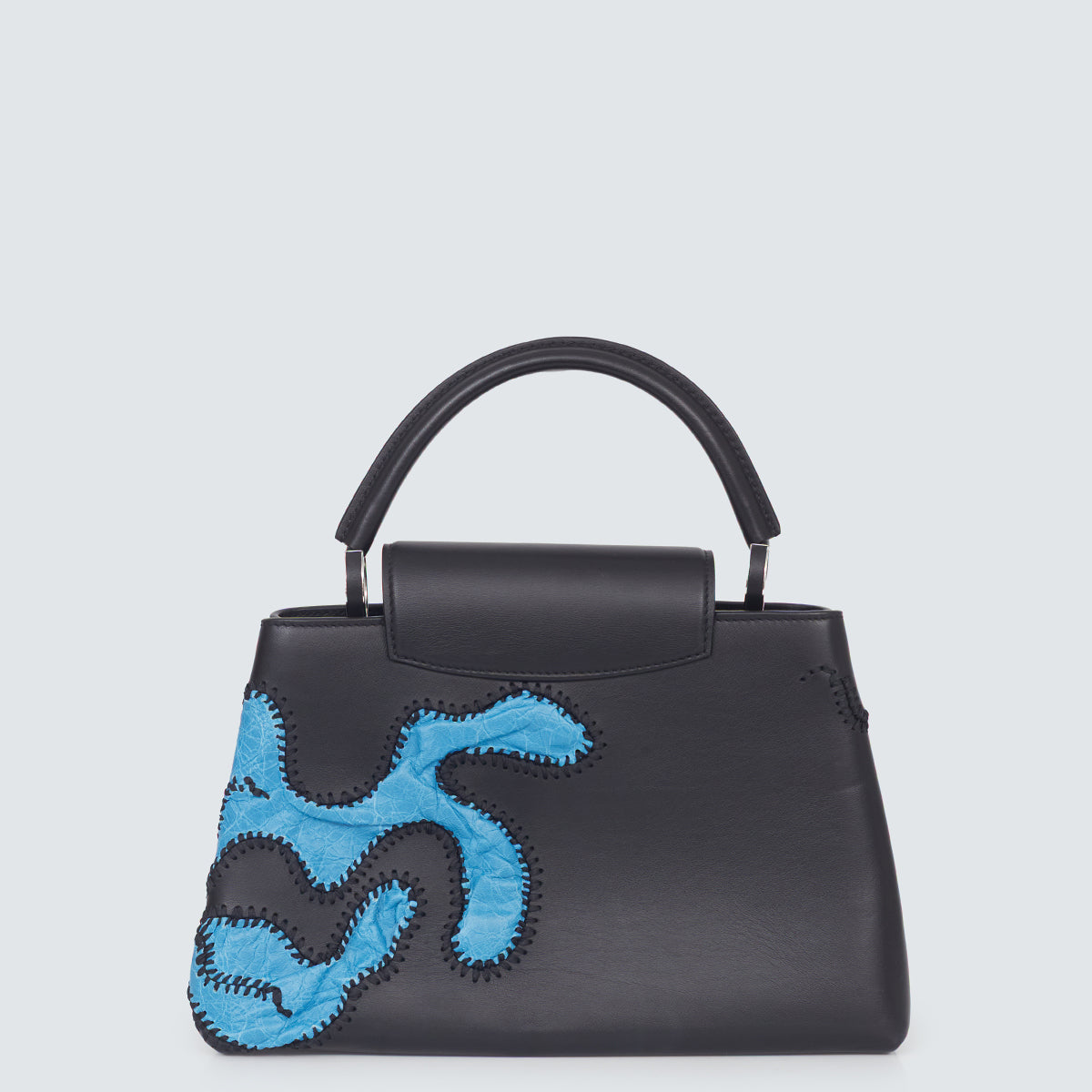 Bolsa Louis Vuitton Arty Capucines