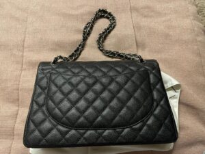 Bolsa Chanel Double Flap Caviar Maxi Preta