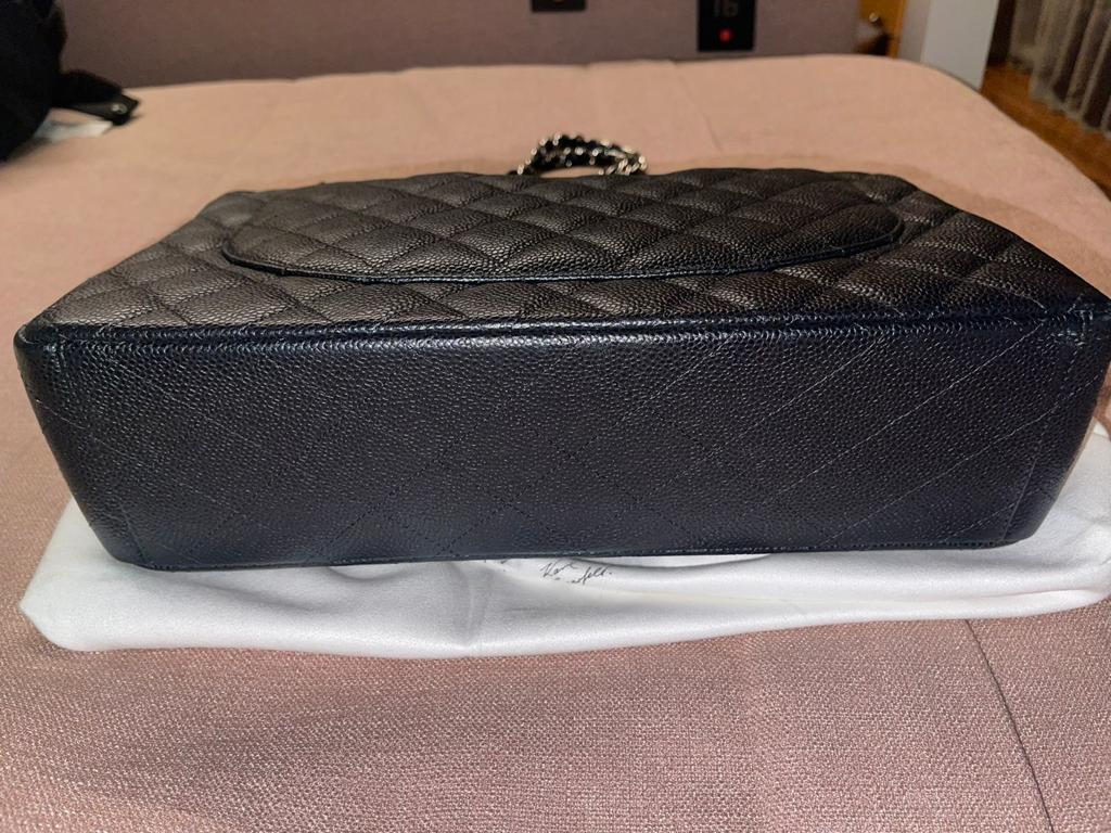 Bolsa Chanel Double Flap Caviar Maxi Preta