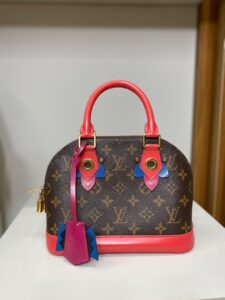Bolsa Louis Vuitton Alma BB Monograma Vermelha