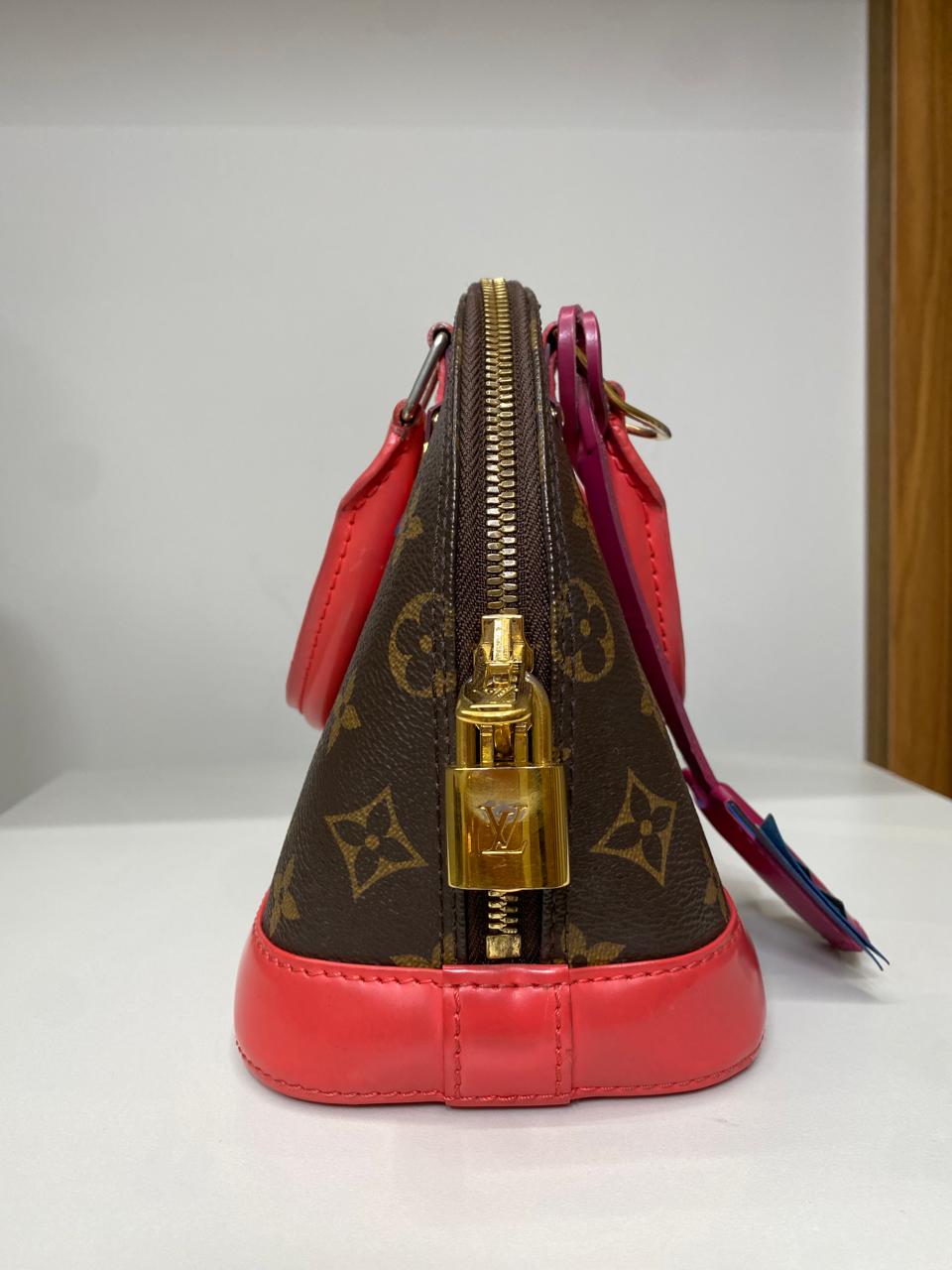 Bolsa Louis Vuitton Alma BB Monograma Vermelha